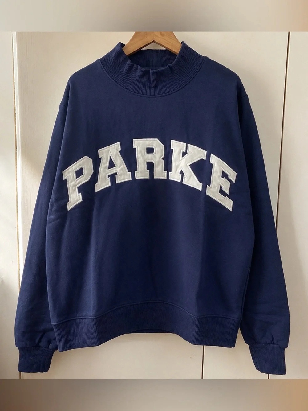 PARKE Navy Mock Neck Half‑Zip Sweatshirt White Arch Logo Patch Pullover